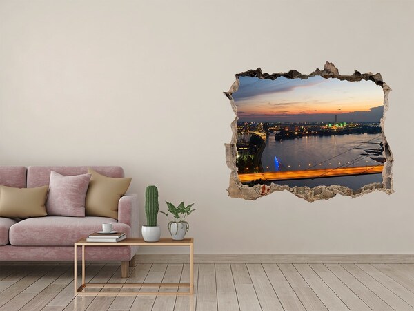 Hole in the wall sticker View of the city at sunset