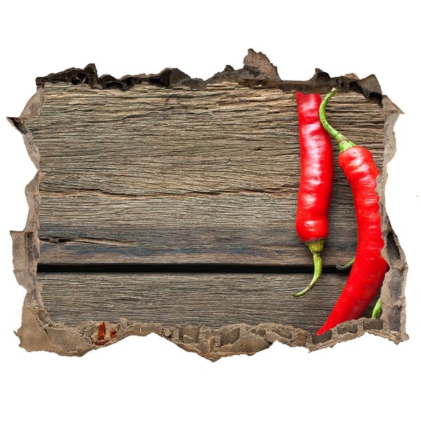 Hole in the wall sticker Chili peppers on a wooden surface