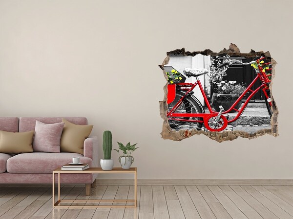 Hole in the wall decal A red bicycle in an urban setting