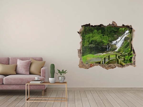 Hole wall sticker Tropical waterfall in the jungle