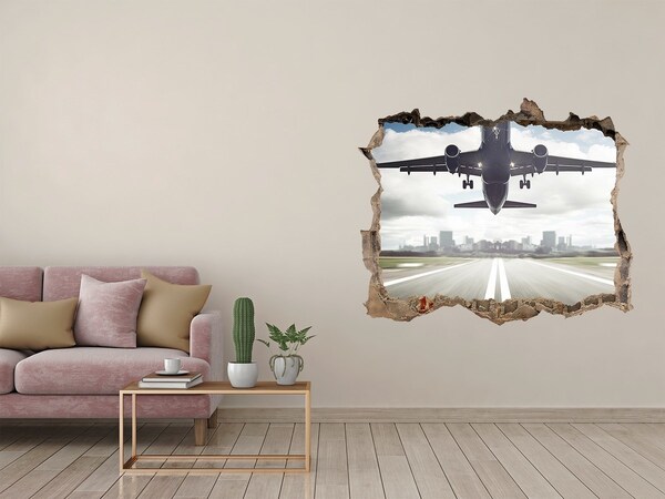 Hole in the wall sticker Plane landing in the city