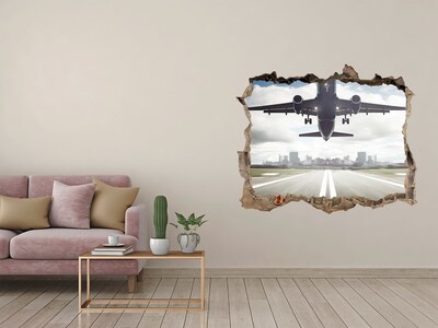 Hole in the wall sticker Plane landing in the city