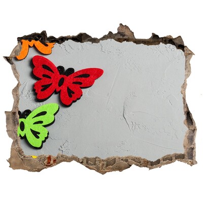 Hole in the wall sticker Colorful butterflies in a hole in the wall
