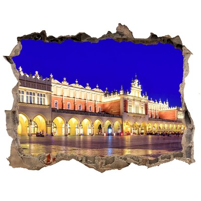 Hole in the wall sticker Krakow's Main Market Square at night