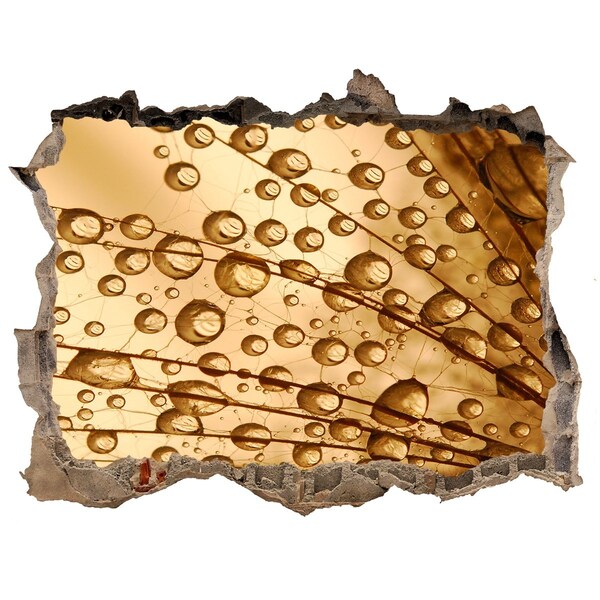 Hole wall sticker A golden drop on the concrete background