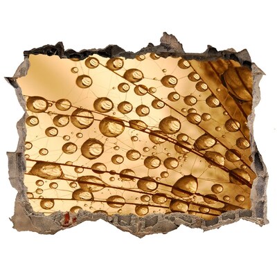 Hole wall sticker A golden drop on the concrete background