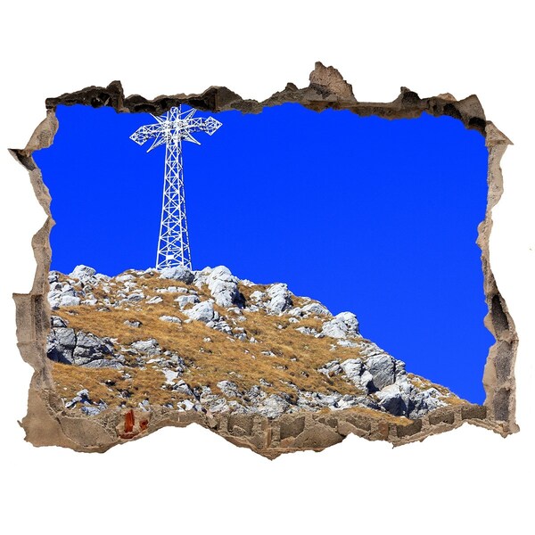 Hole in the wall sticker Mountain landscape through a hole in the wall