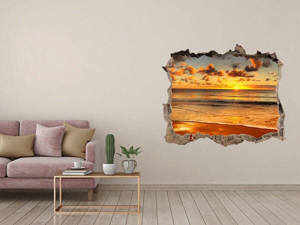 Hole in the wall sticker Sunset over the ocean