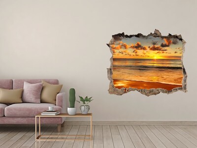 Hole in the wall sticker Sunset over the ocean