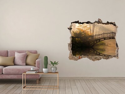 Hole in the wall sticker Old bridge in autumn