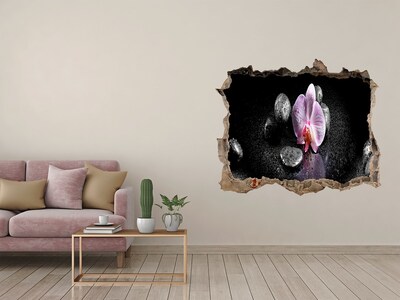 Hole wall sticker Orchid flower surrounded by stones