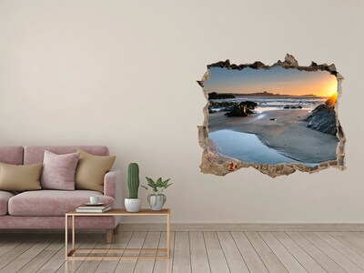 Hole in the wall sticker Sunset over the beach