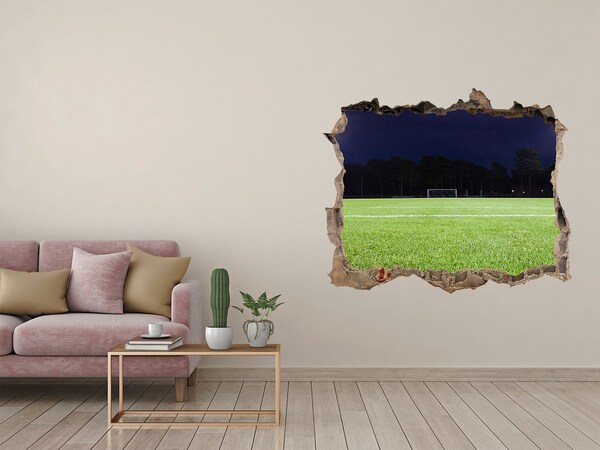 Hole in the wall sticker Football pitch at night