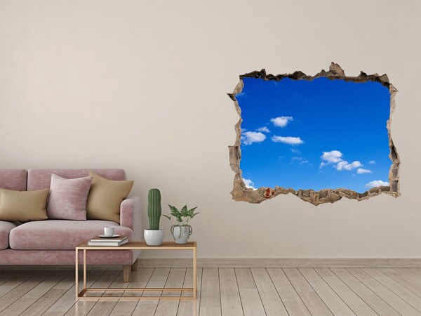 Hole in the wall sticker Blue sky with clouds