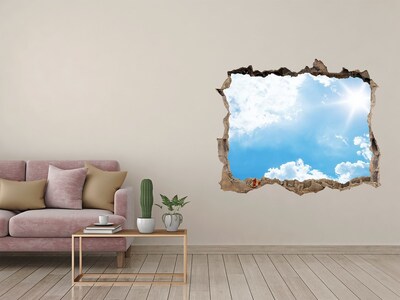 Hole in the wall sticker Blue sky with clouds