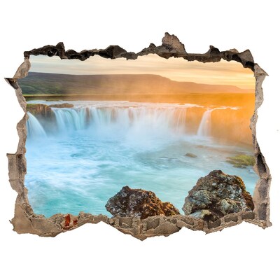 Hole in the wall sticker Waterfall in the setting sun