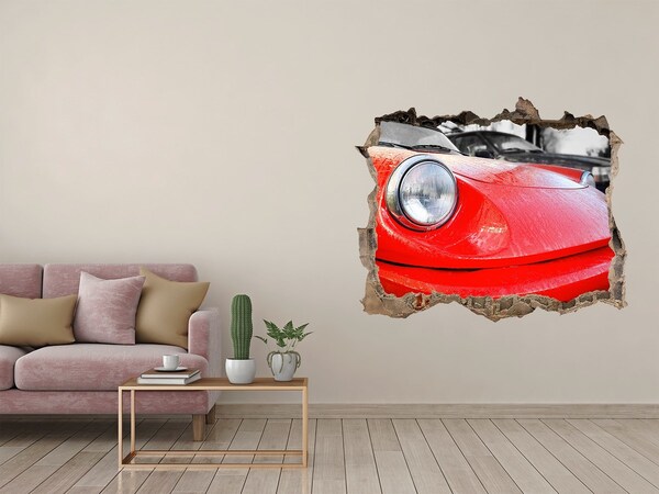 Hole wall sticker Red sports car behind the hole in the wall