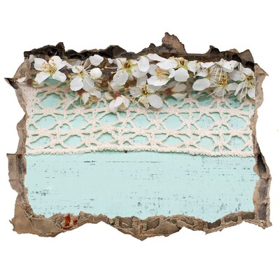 Hole in the wall sticker Floral motif on a blue wood background
