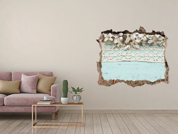Hole in the wall sticker Floral motif on a blue wood background