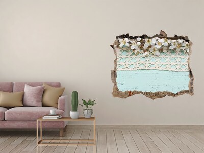 Hole in the wall sticker Floral motif on a blue wood background