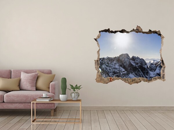 Hole in the wall decal Mountain landscape with sun rays