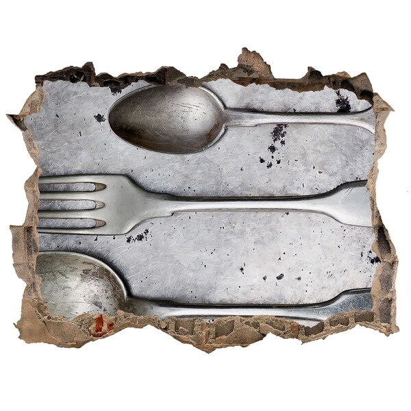 Hole in the wall sticker A broken wall with a view of the cutlery