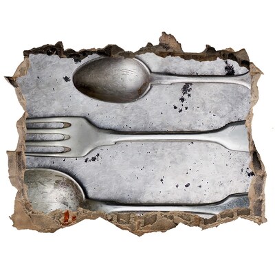 Hole in the wall sticker A broken wall with a view of the cutlery