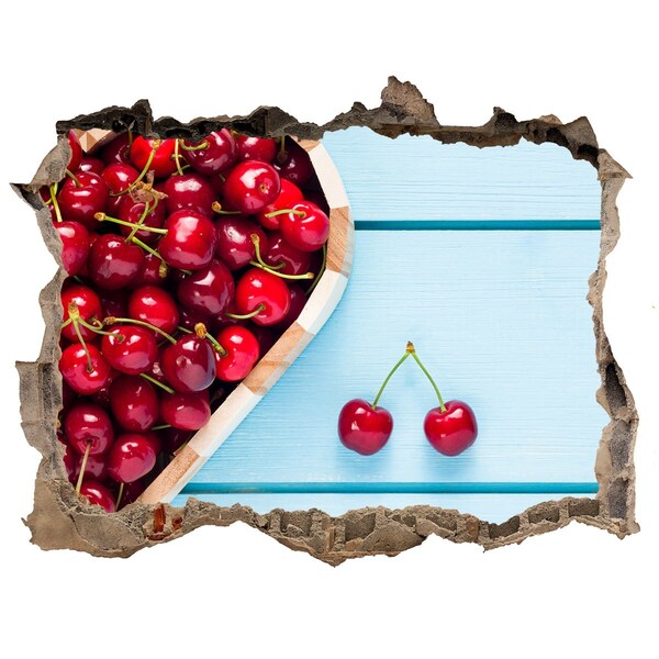 Hole wall sticker Sweet cherries on a blue background