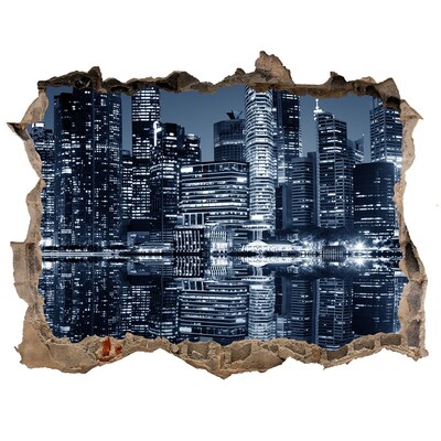 Hole in the wall sticker City at night by the river