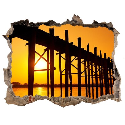 3D wall hole wallpaper Sunset over the pier