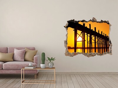 3D wall hole wallpaper Sunset over the pier