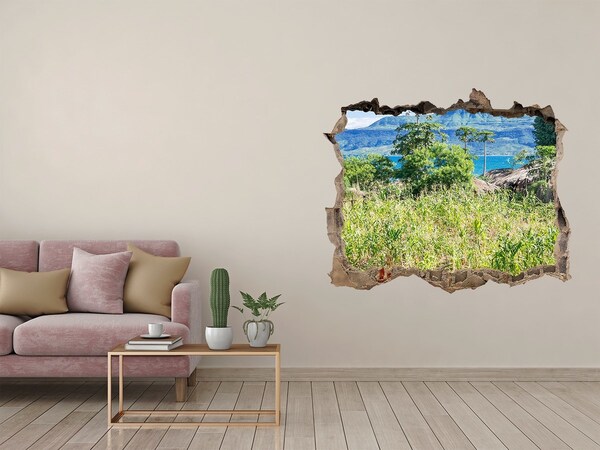Hole in the wall sticker Tropical landscape behind the hole in the wall