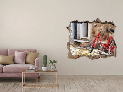 Hole in the wall sticker A red bicycle in a charming street