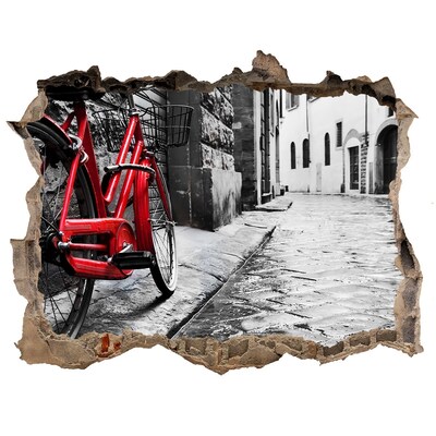Hole in the wall sticker A red bicycle in a charming street