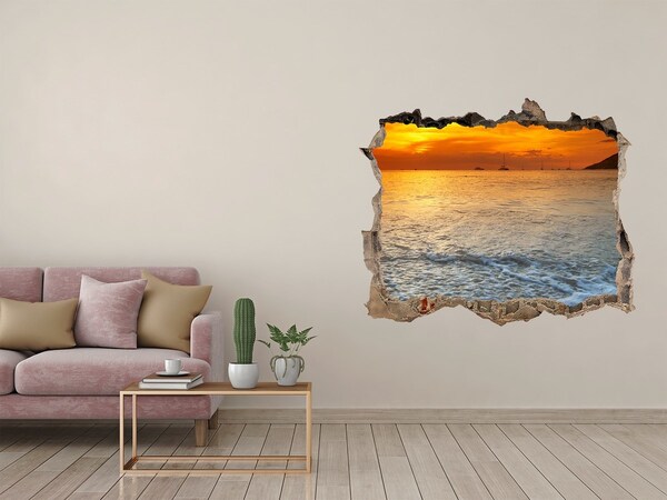 Hole wall sticker Sunset over the sea
