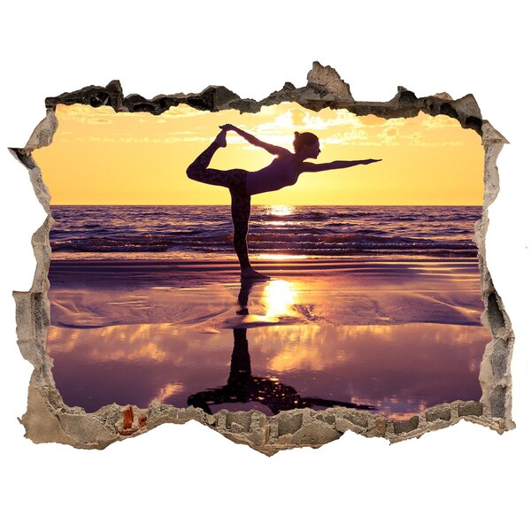 Hole in the wall sticker Yoga on the beach at sunset