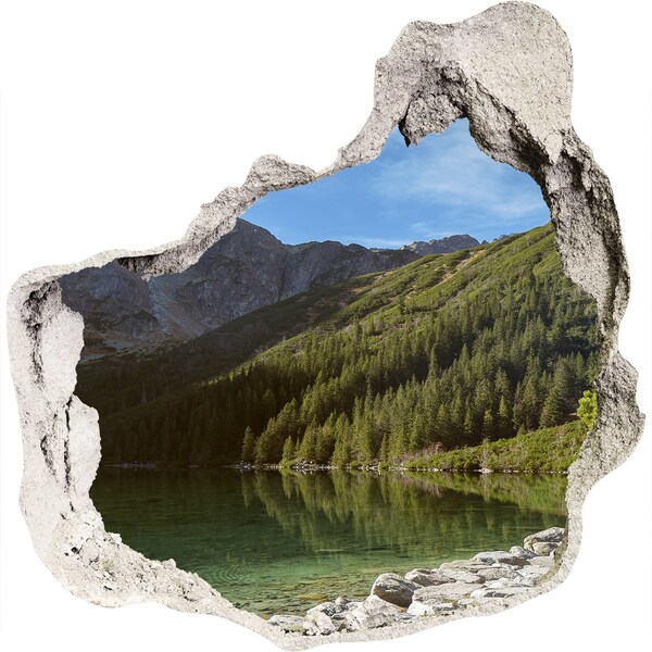 Hole wall sticker Mountain lake in the valley