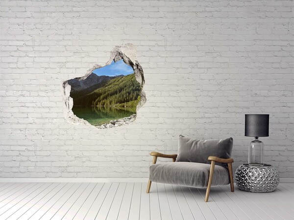 Hole wall sticker Mountain lake in the valley