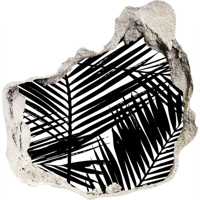 Hole wall sticker Tropical leaves in a hole in the wall