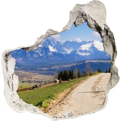 3D wall hole wallpaper Mountain landscape behind the hole in the wall