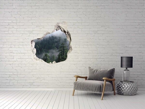 Hole in the wall sticker Green forest in the clouds