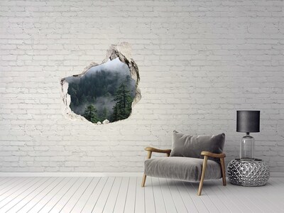 Hole in the wall sticker Green forest in the clouds