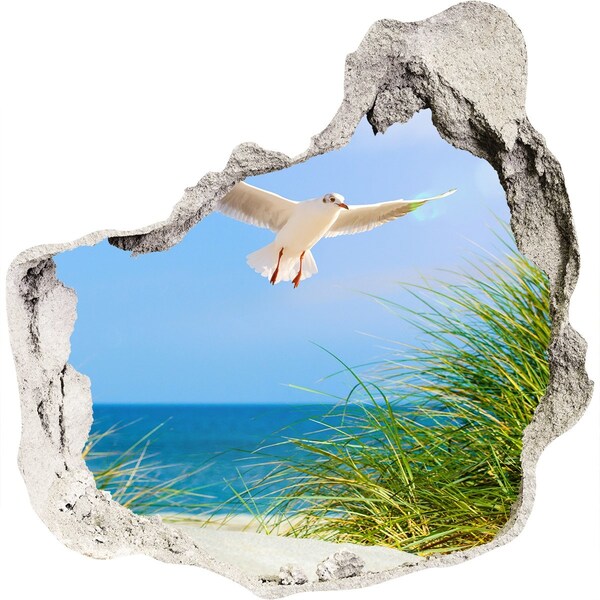 Hole wall sticker View of the beach with a seagull