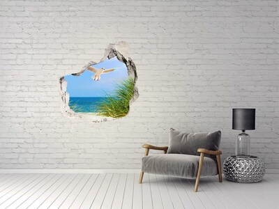 Hole wall sticker View of the beach with a seagull