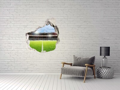 Hole in the wall sticker Football stadium from behind the wall