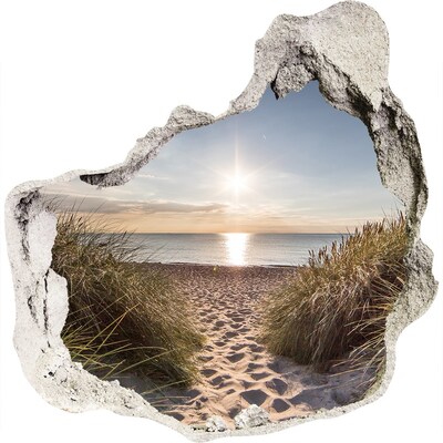 Hole wall sticker Sunset over the beach