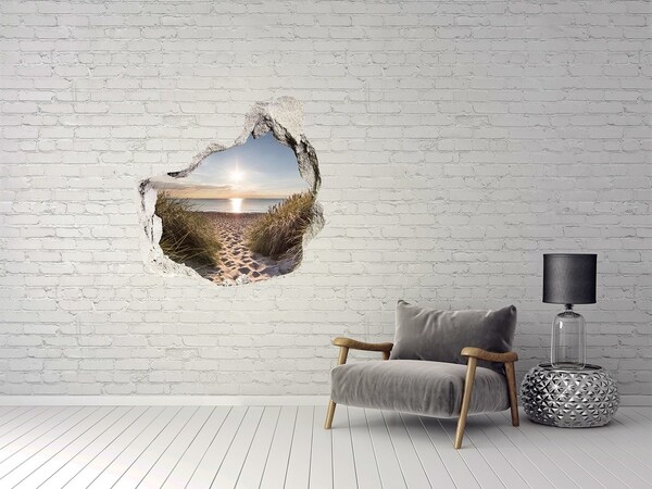 Hole wall sticker Sunset over the beach
