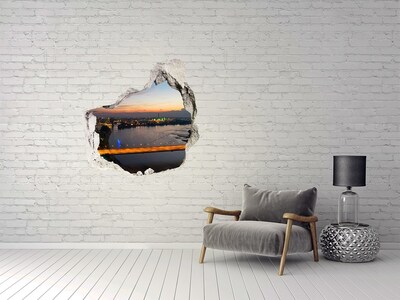 Hole in the wall sticker View of the city at sunset