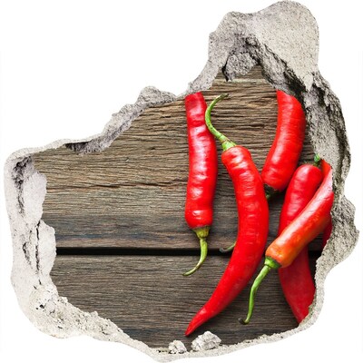 Hole in the wall sticker Chili peppers on a wooden surface