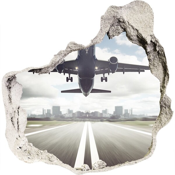 Hole in the wall sticker Plane landing in the city